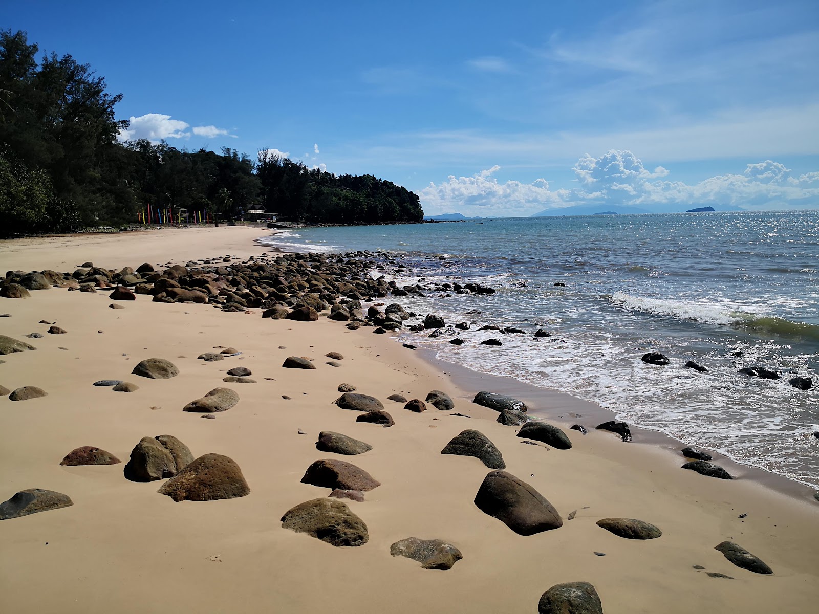 Photo of Damai Beach with turquoise water surface