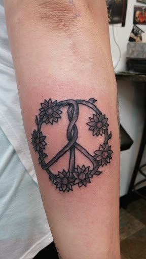 Explore sleeve tattoo ideas men, creative tattoo ideas in Enid, available at IRONHORSE TATTOO & BODY PIERCING STUDIO,LLC