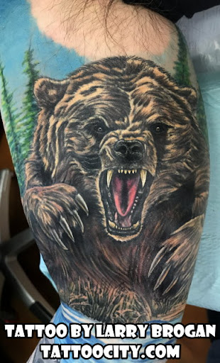 Explore feminine sleeve tattoo ideas, creative tattoo ideas in Lockport, available at Tattoo City by Larry Brogan