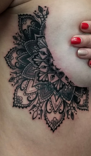 Explore woodstock tattoo ideas, creative tattoo ideas in Prairieville, available at Nolana Tattoo & Piercing