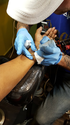 Tattoo Shop «Idle Hands Tattoo & Piercing», reviews and photos, 929 W Douglas Ave, Wichita, KS 67213, USA