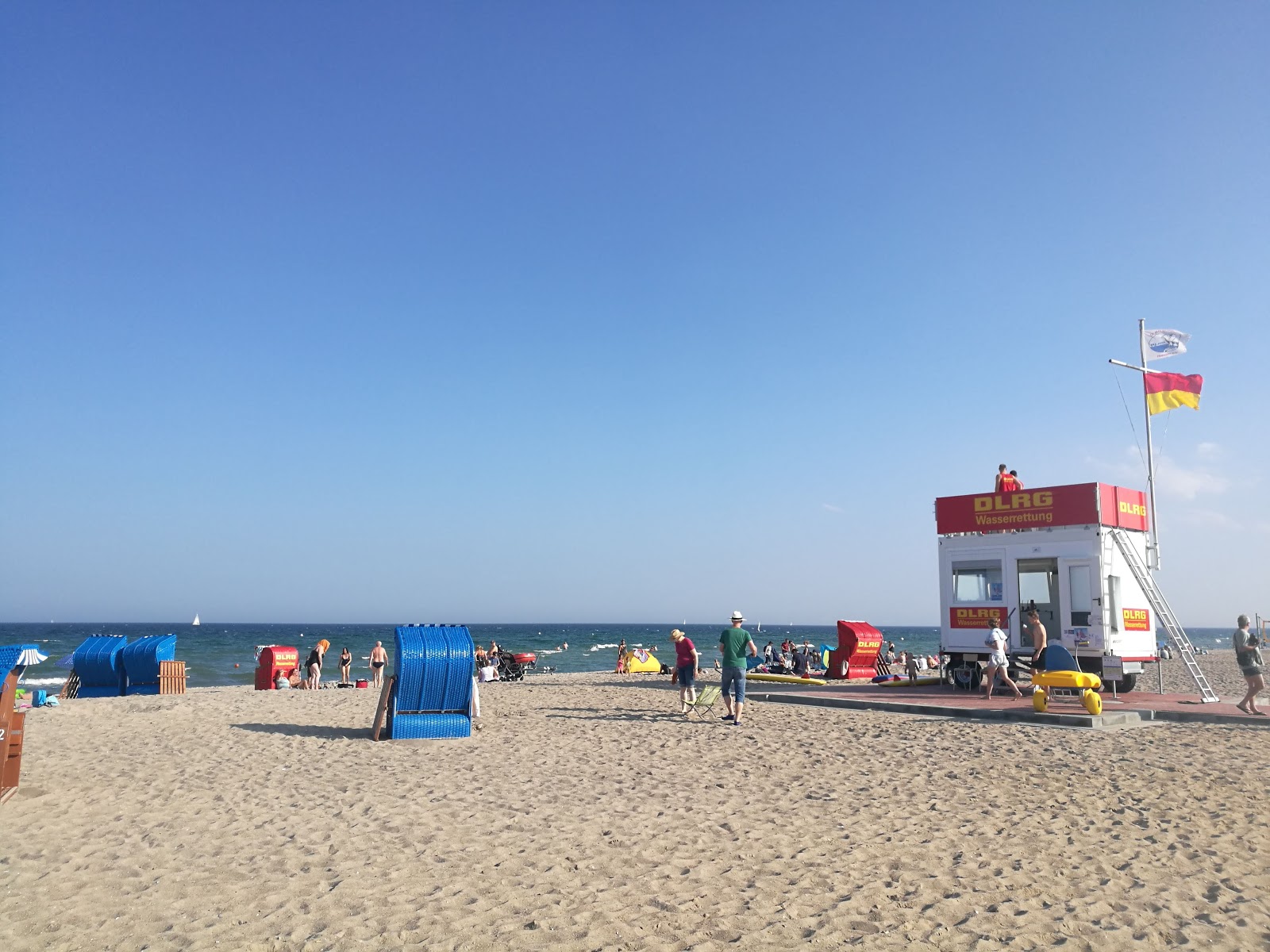 Foto von Weidefelder strand und die siedlung