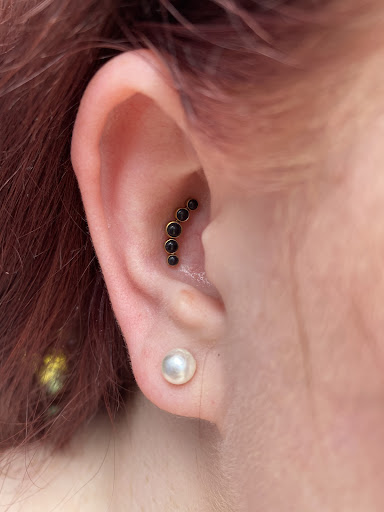 Explore fishing pole tattoo ideas, creative tattoo ideas in Houston, available at Body Art Piercing Studio