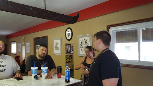 Explore c section scar tattoo ideas, creative tattoo ideas in Akron, available at Absolute Tattoo Company