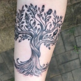 Explore march birth flower tattoo ideas, creative tattoo ideas in Vermillion, available at IKTOMI-INK Tattoo Experience