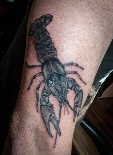 Explore cleveland browns tattoo ideas, creative tattoo ideas in Lander, available at Blackblood Tattoo and Piercing