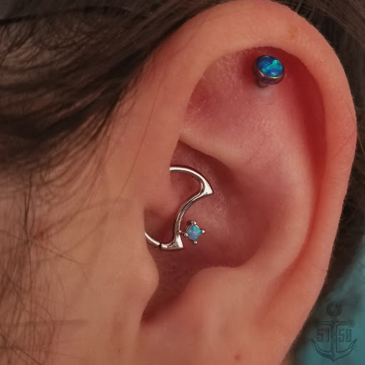 Explore smile tattoo ideas, creative tattoo ideas in Kearney, available at Studio 5150 Piercing & Fine Jewelry