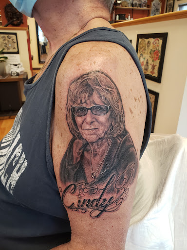 Explore neck tattoo idea men, creative tattoo ideas in Concord, available at The Gallery Tattoo Studio