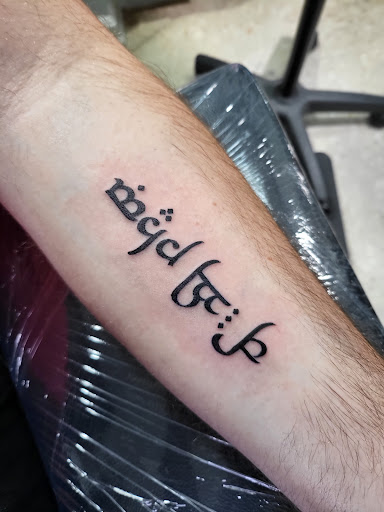 Explore upper arm cover up tattoo ideas, creative tattoo ideas in Carrollton, available at Neeces UniqueINK