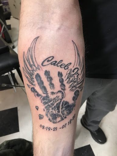 Explore thigh tattoo ideas for men, creative tattoo ideas in Waynesboro, available at Extreme Expressions