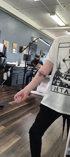 Explore unique tramp stamp tattoo ideas, creative tattoo ideas in Lakeland, available at Holy Grail Tattoo