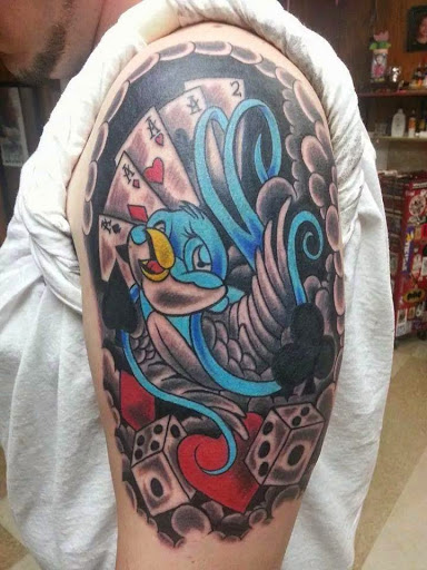 Explore haunted house tattoo ideas, creative tattoo ideas in La Crosse, available at La Crosse Tattoo