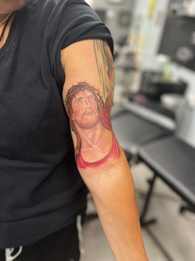 Explore weightlifting tattoo ideas, creative tattoo ideas in Scranton, available at Hometown Ink