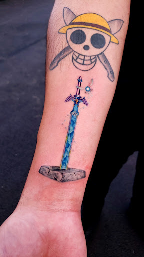 Explore sheet music tattoo ideas, creative tattoo ideas in Miami, available at Glitterpoop Studios