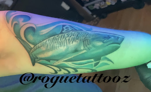 Explore cover up ideas for name tattoos, creative tattoo ideas in Bristol, available at Rogue Tattoos