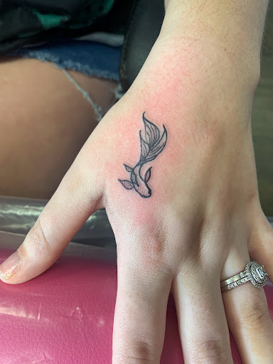 Explore aztec neck tattoo ideas, creative tattoo ideas in Lake City, available at Crooked Spines Tattoo Studio