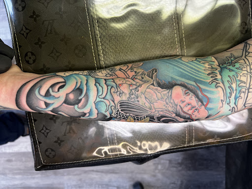Explore tattoo ideas for gangsters, creative tattoo ideas in Clearfield, available at Image Injection Tattoo & Piercing studio