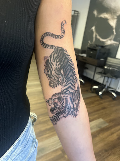 Explore female leg tattoo ideas, creative tattoo ideas in Midvale, available at Dark Arts Tattoo & Dark Mark Piercing Studio