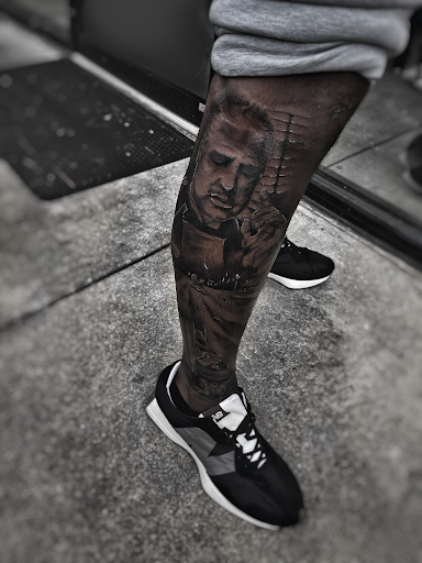 Explore banger tattoo ideas, creative tattoo ideas in Lavonia, available at 1890 Tattoo Co.