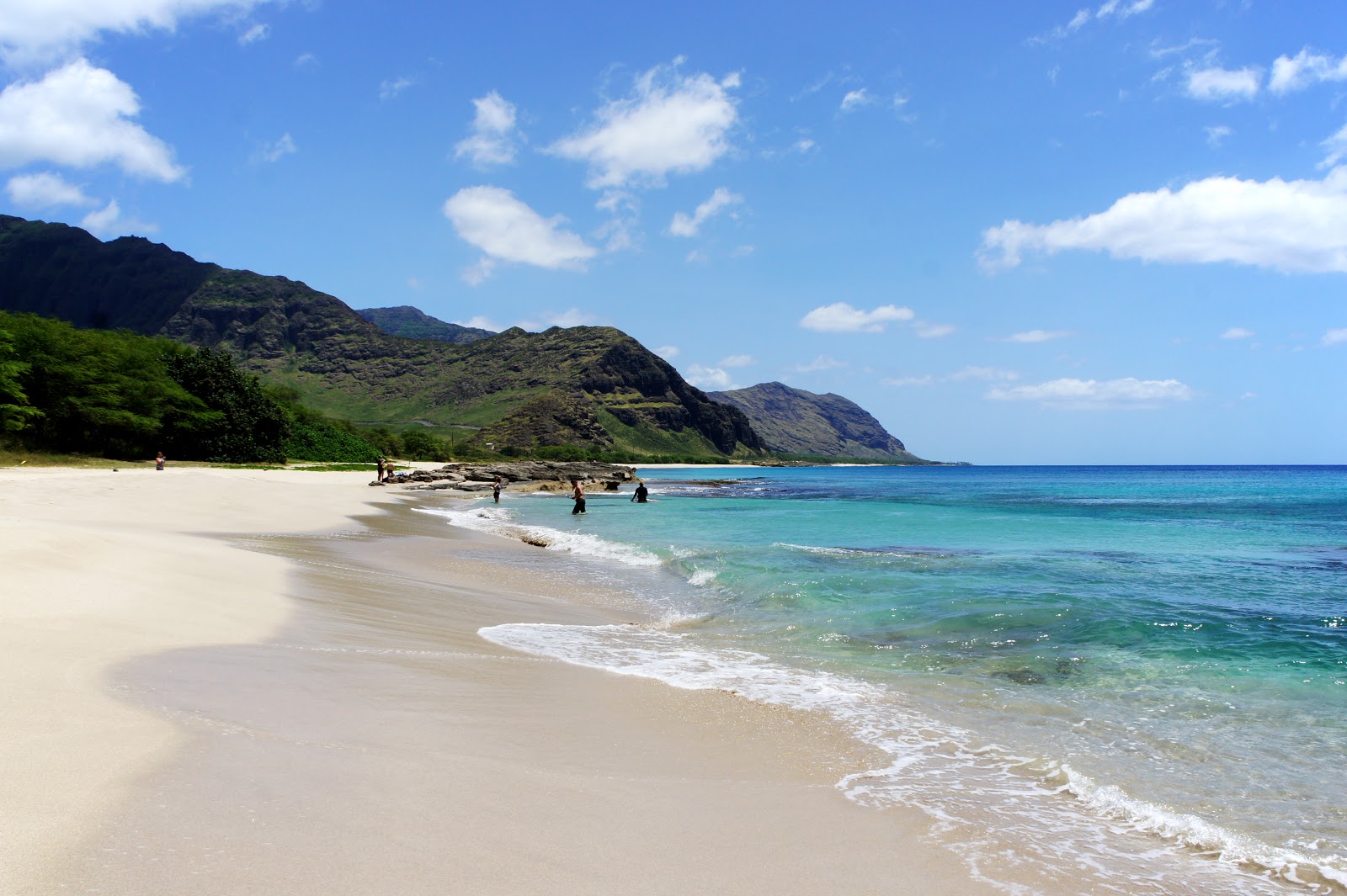 Photo of Keaau Beach with turquoise pure water surface