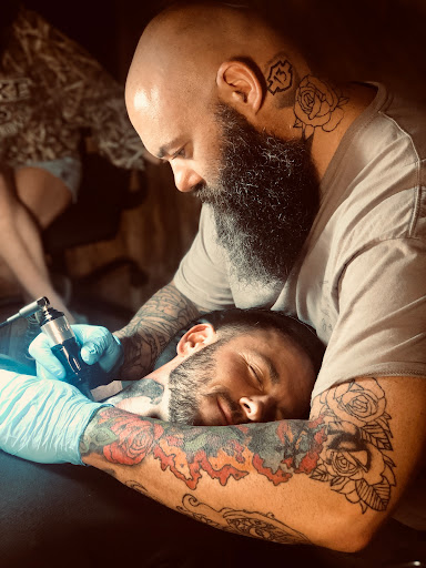 Explore electric guitar tattoo ideas, creative tattoo ideas in Gautier, available at Voodoo Tattoo
