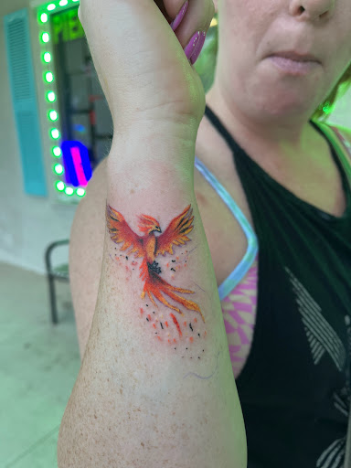 Explore planchette tattoo ideas, creative tattoo ideas in Foley, available at Symbolic Ink Tattoo Studio