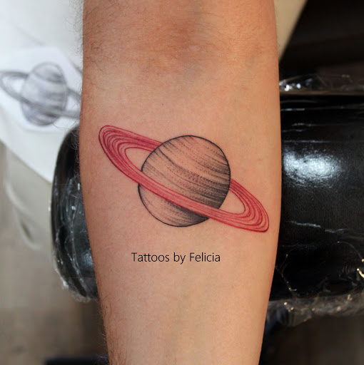 Explore grease tattoo ideas, creative tattoo ideas in Fort Myers, available at Tiger Lotus Tattoo and Piercing