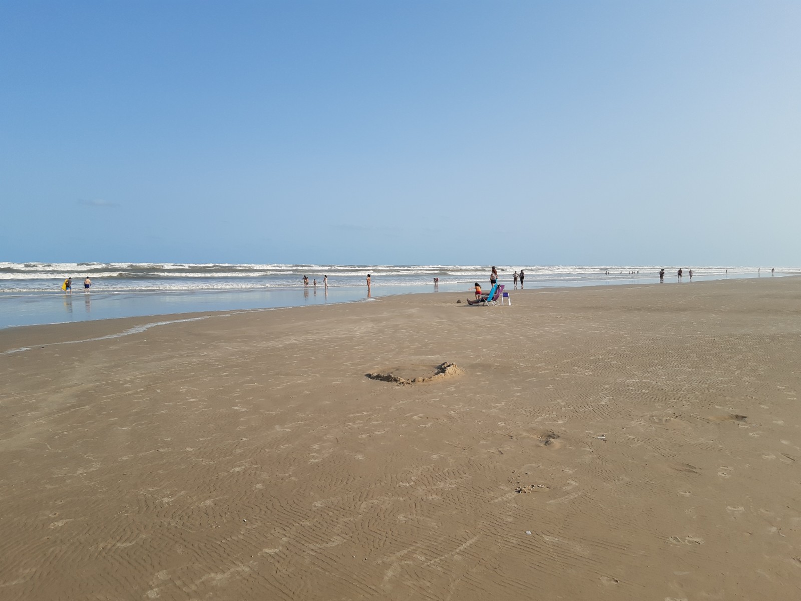 Photo de Nouvelle plage de Tramandai avec l'eau turquoise de surface