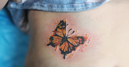 Explore outer forearm tattoos for men ideas, creative tattoo ideas in Middletown, available at Inkers Guild