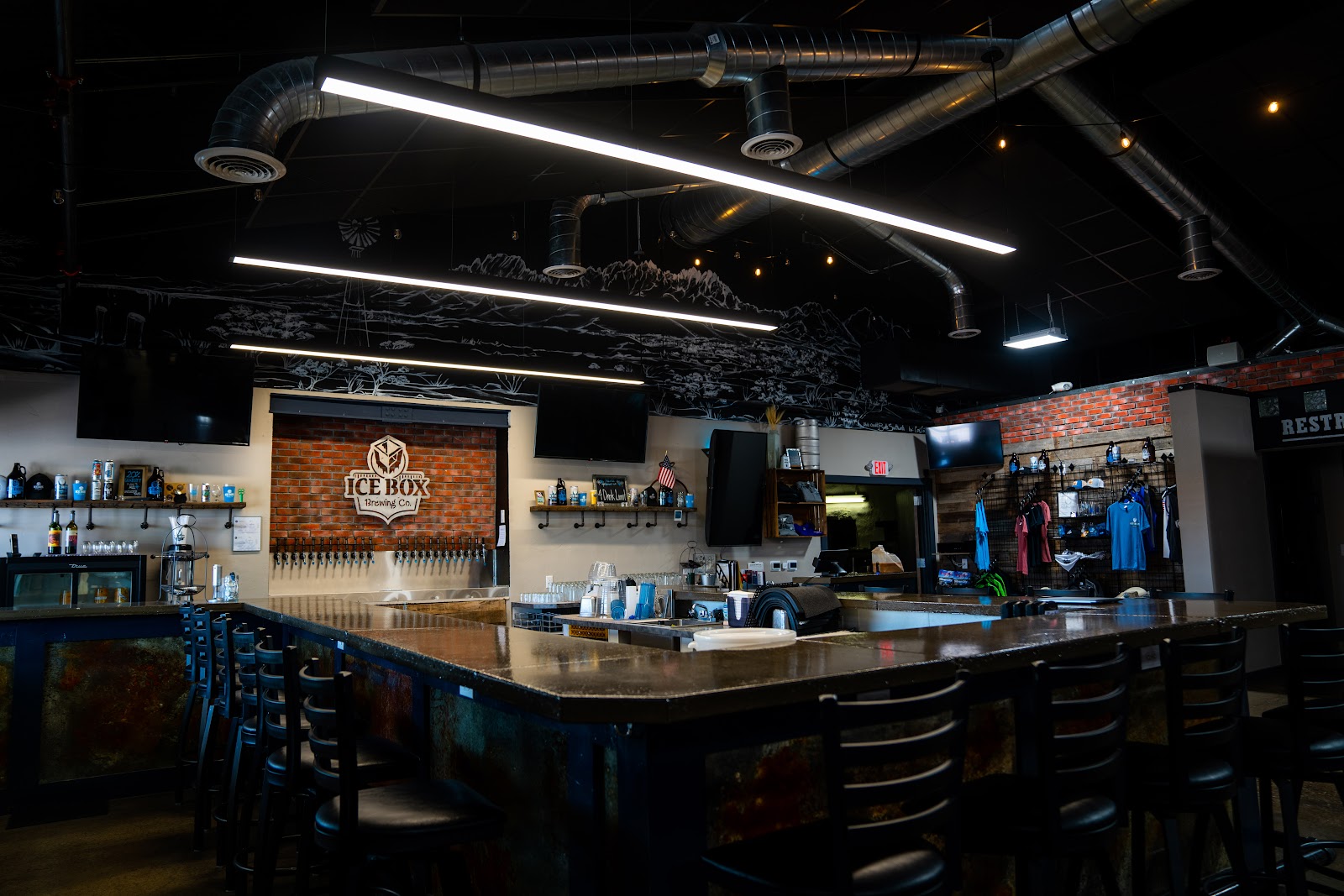 Beer taps lined up on a bar