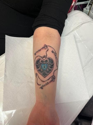 Explore m tattoo ideas, creative tattoo ideas in Sioux City, available at Inkspired Atelier