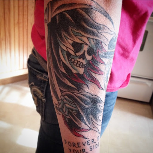 Explore bottom leg tattoo ideas, creative tattoo ideas in Dekalb, available at Proton Tattoo