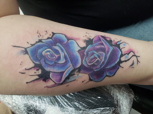 Find mother tattoos ideas for your next unique tattoo in Vinton at Cherry Bomb Tattoo and piercing