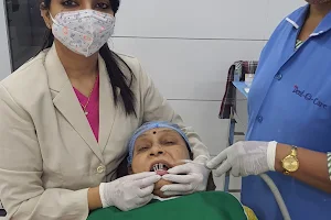DR Nimisha modi / Dent O Care Advance Multi-speciality Implant Center / Best Dentist / Best Dental Clinic in Adajan image