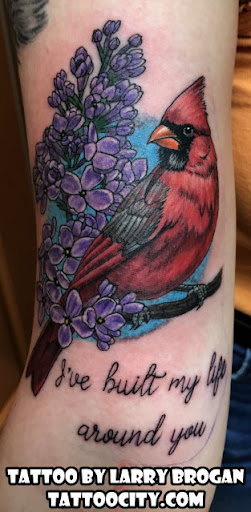 Explore photographer tattoo ideas, creative tattoo ideas in Lockport, available at Tattoo City by Larry Brogan