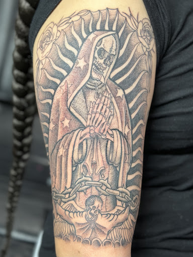 Explore flower arm sleeve tattoo ideas, creative tattoo ideas in Los Angeles, available at Chaotic tattoos