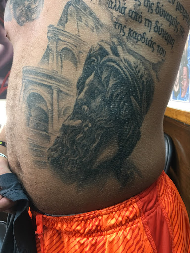 Explore demon slayer sword tattoo ideas, creative tattoo ideas in Cleveland, available at American Tattoo Studios