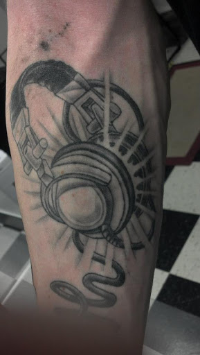 Explore half sleeve tattoo ideas for men with meaning, creative tattoo ideas in Pelham, available at Tattoo Fever