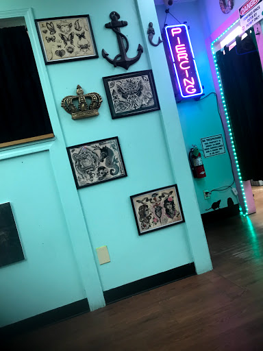 Explore fishing tattoo ideas for men, creative tattoo ideas in Lafayette, available at Crown & Anchor Tattoos