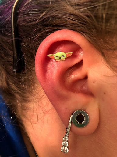Explore small travel tattoo ideas, creative tattoo ideas in Palm Harbor, available at Angry Owl Tattoo and Piercing