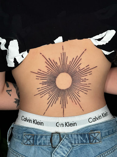 Explore mental health ribbon tattoo ideas, creative tattoo ideas in Corona, available at Crop Circles Tattoo Studio