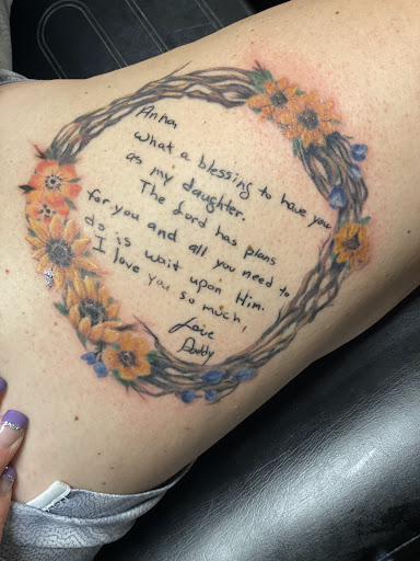 Find tattoo ideas for woman on leg for your next unique tattoo in Walnut Cove at Wildfire Tattoo Studio