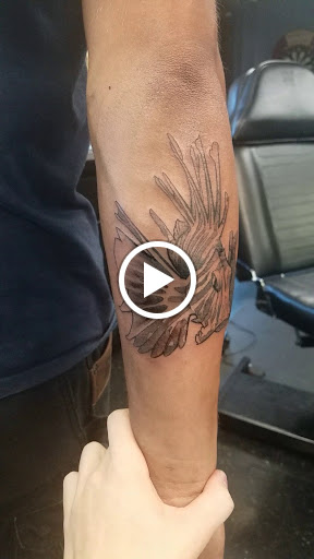 Find biohazard tattoo ideas for your next unique tattoo in Wakefield at Black Lotus Tattoo Studios