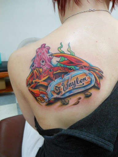 Find arm band tattoo ideas for your next unique tattoo in Bowling Green at Taboo Tattoos and Piercings