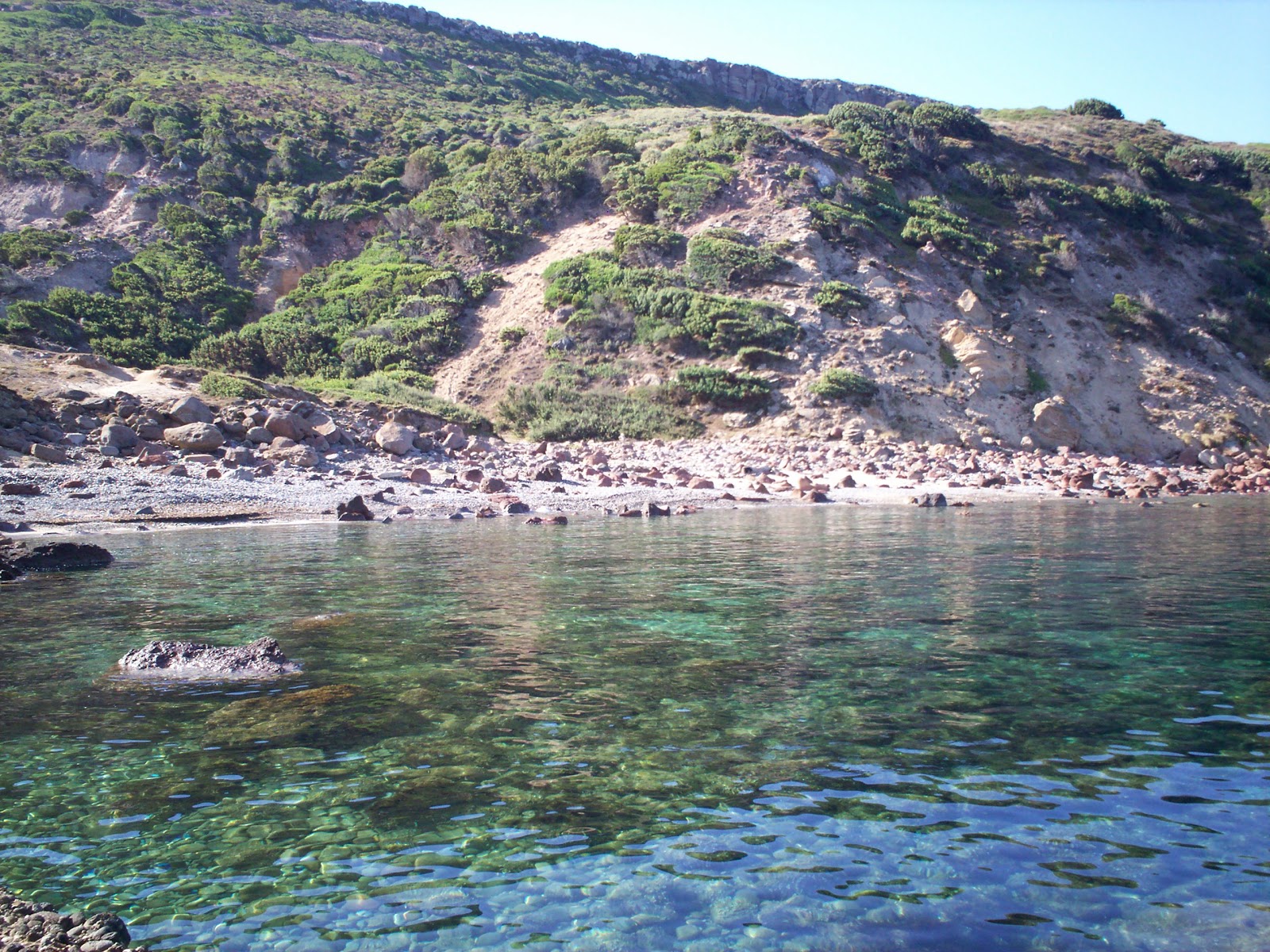 Φωτογραφία του Acqua sa Canna με καθαρό νερό επιφάνεια