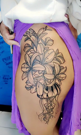 Explore cover up tattoo ideas for lower back, creative tattoo ideas in Saint Petersburg, available at Ink Godz Tattoos