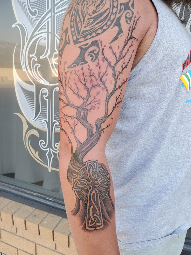 Explore dagger tattoo ideas, creative tattoo ideas in Orem, available at Hearts and Hands Tattoo and Piercing