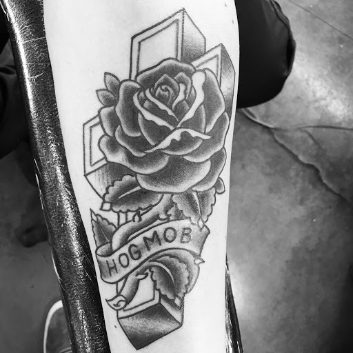 Explore man face tattoo ideas, creative tattoo ideas in Reno, available at Aces Tattoo