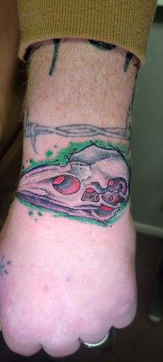 Explore hard tattoo ideas, creative tattoo ideas in Angola, available at Hoodlum Ink