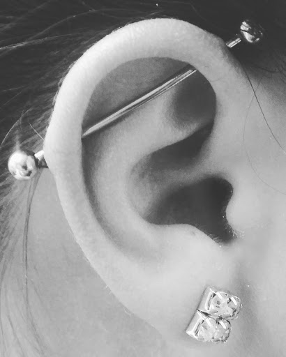 Explore hand tattoo idea, creative tattoo ideas in Albuquerque, available at Staceys Exotic Body Piercing and Tattoo